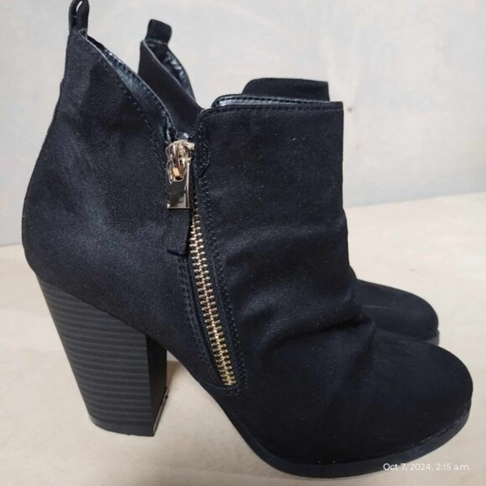 Call it Spring Heeled boot jet black ankle bootie with gold zippers‎ curved toe